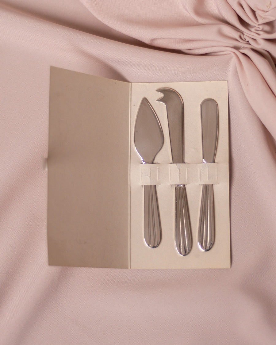 Sidabru dengti sūrio serviravimo peiliukai