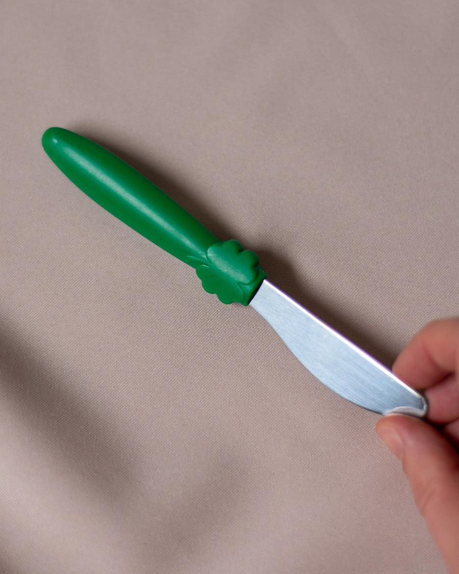 Sviesto peiliukas su žalia plastikine rankena